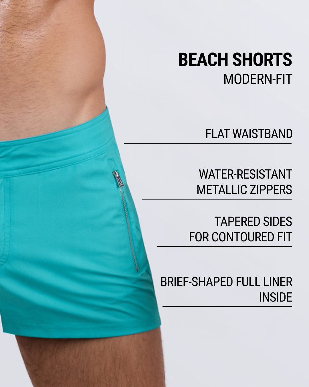 Close-up side view of a male model wearing the ATLANTIS Beach Shorts for men by DC2 Miami in a solid light aqua blue color. These modern-fit swim shorts feature a sleek flat waistband, water-resistant metallic zippers, and tapered sides for a contoured fit. Designed with a brief-shaped full liner for added support, these premium beach shorts blend style, comfort, and functionality for the ultimate swimwear experience.