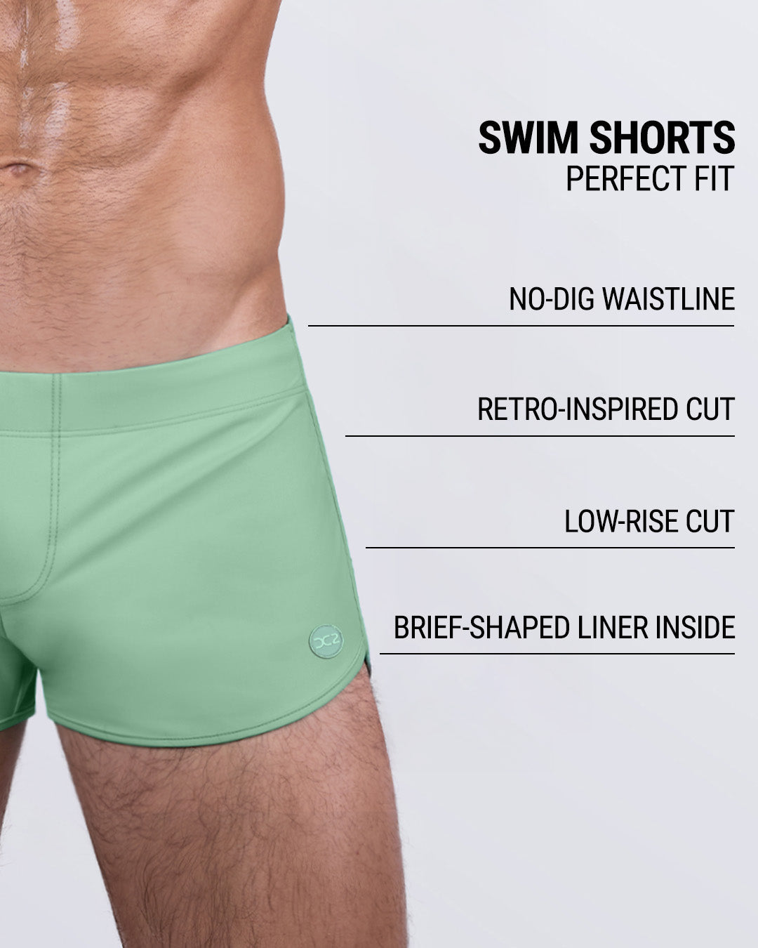DC2 Cabana Green Swim Shorts — detail view highlighting no-dig waistband, retro-inspired short length, and signature DC2 logo.