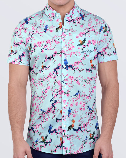 Close to You short sleeve cotton shirt with light blue base, cherry blossoms, and colorful bird print by DC2 Miami.