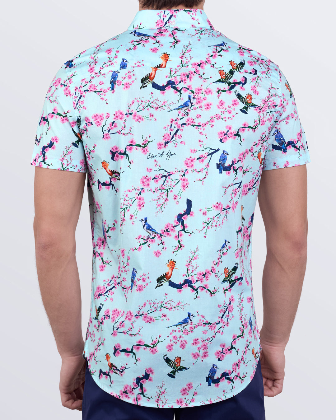 Back view of Close to You shirt showing full floral and bird print design with "Close to You" detail.