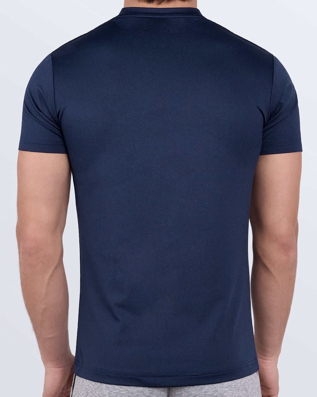 DC2 CORE BLUE Fitness T-shirt — back view highlighting the smooth, streamlined cut and breathable material designed for movement.