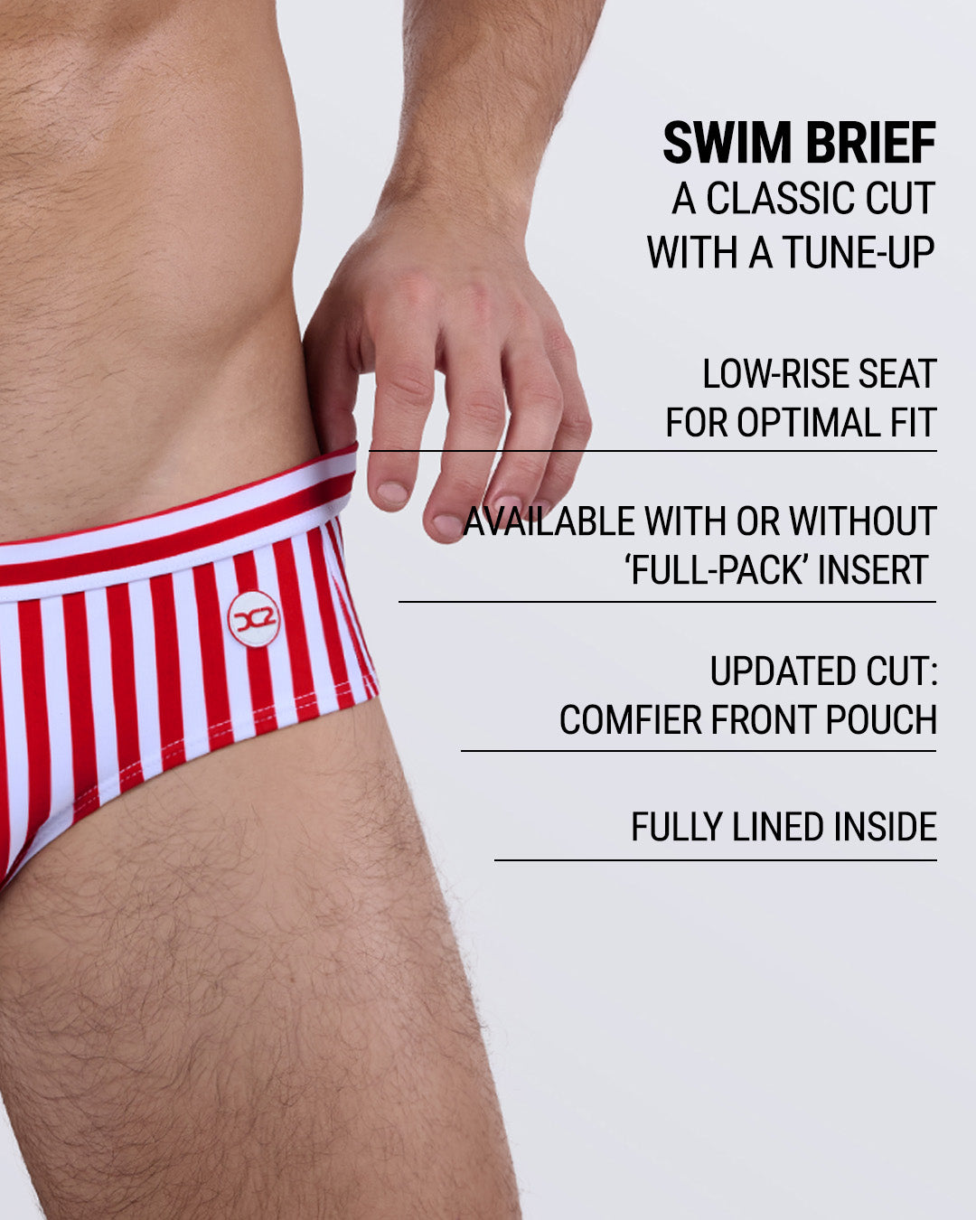 Side view of DC2 FAST LINES (RAPID RED) swim brief with bold red and white stripes, showcasing design highlights like low-rise fit, full-pack insert option, and comfortable pouch with feature text overlay.
