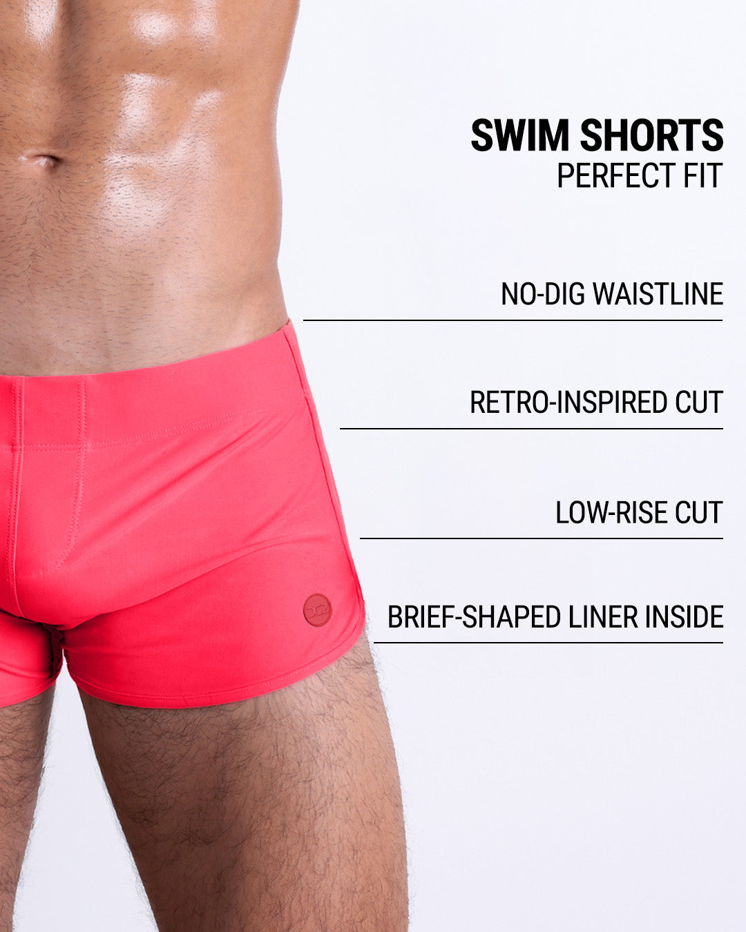 DC2 HIGH VOLTAGE RED Swim Shorts — close-up front detail emphasizing smooth waistband and signature DC2 logo on left thigh.