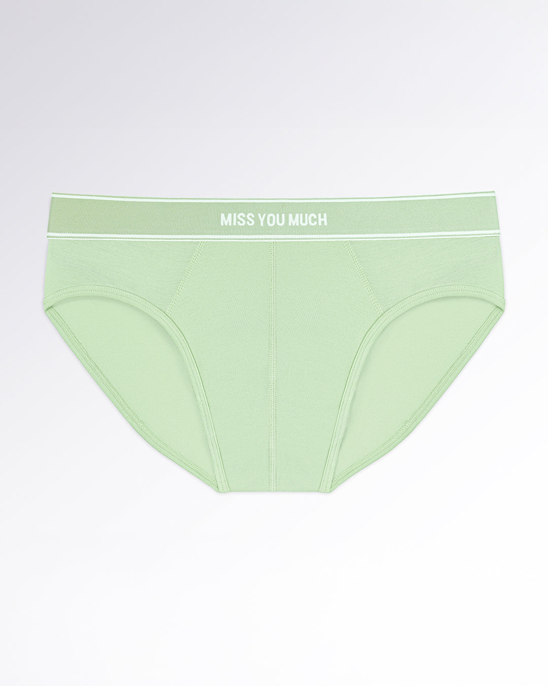 MISS YOU MUCH Modal Briefs — flatlay of soft mint-green men’s modal briefs with a contoured pouch and elastic waistband featuring white text detailing.