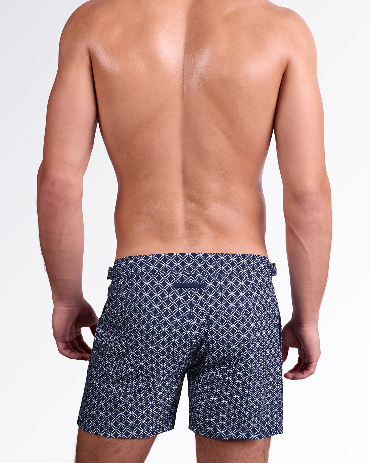 DC2 Miami Mono Waves Tailored Shorts — back view showing the blue geometric print, tailored silhouette, and rear welt pocket detail.
