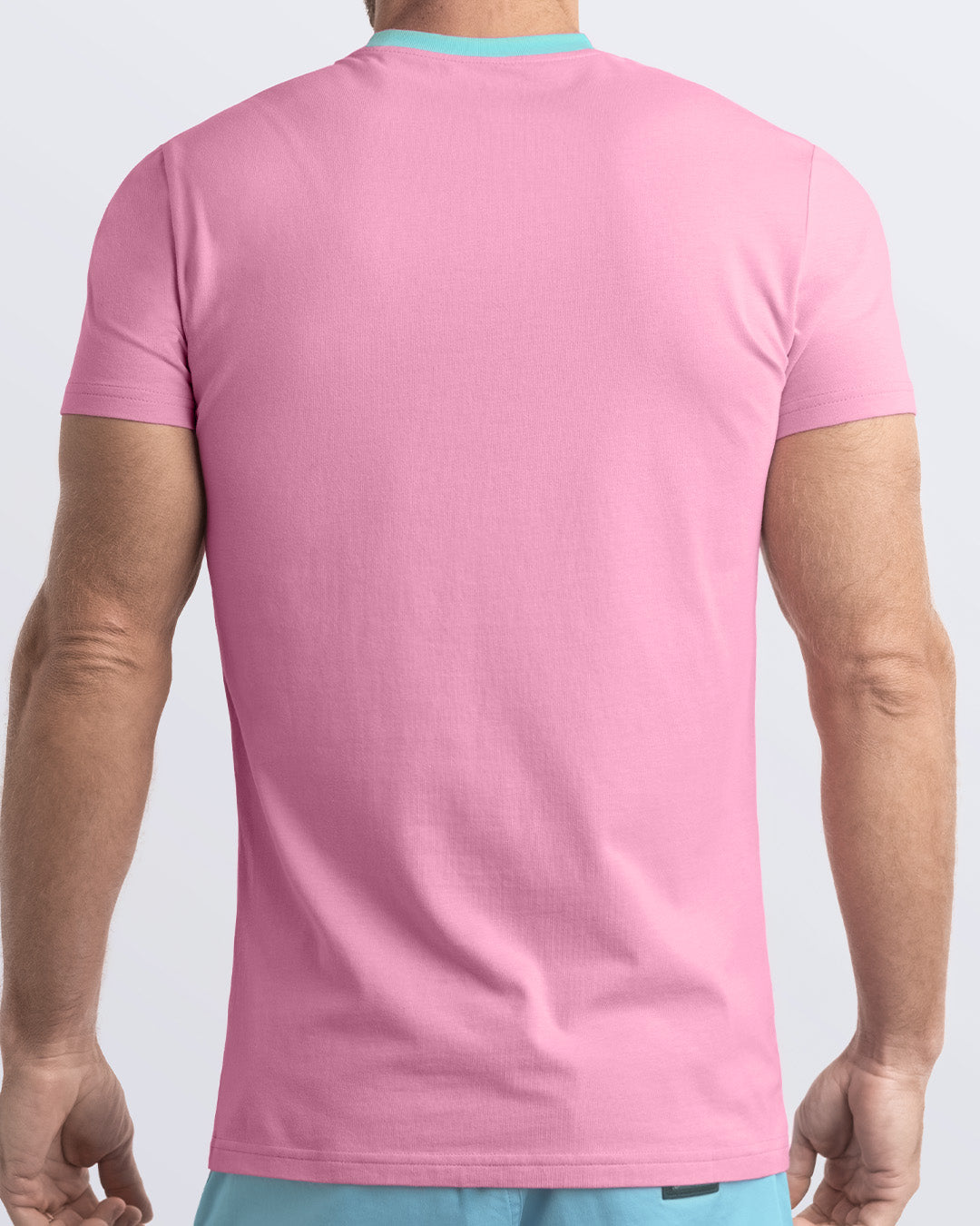 Back view of a baby pink color men's t-shirt with a vibrant light aqua collar, made from soft, durable and breathable Pima cotton. Part of the DC2 Miami men's streetwear and beachwear collection, ideal for casual summer outfits.