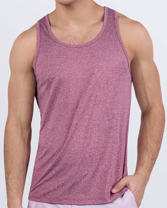 Male model wearing DC2 RIPPED CRIMSON gym tank top in deep heather red, designed for men’s workouts and fitness training. Breathable, moisture-wicking fabric ideal for gym and beach.