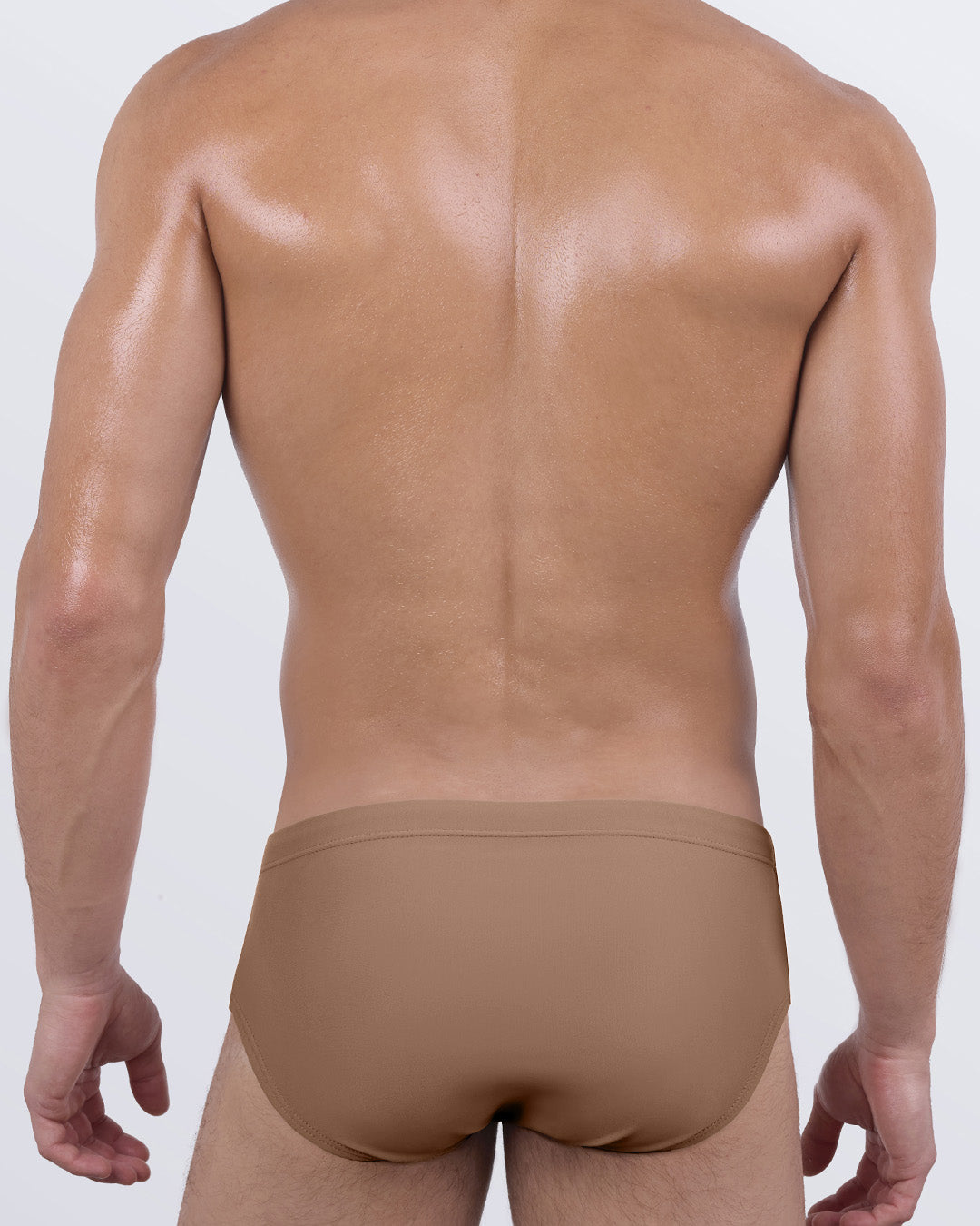 Back view of DC2 SKINNY DIP (TAN) swim sunga featuring snug fit with moderate coverage and clean silhouette.