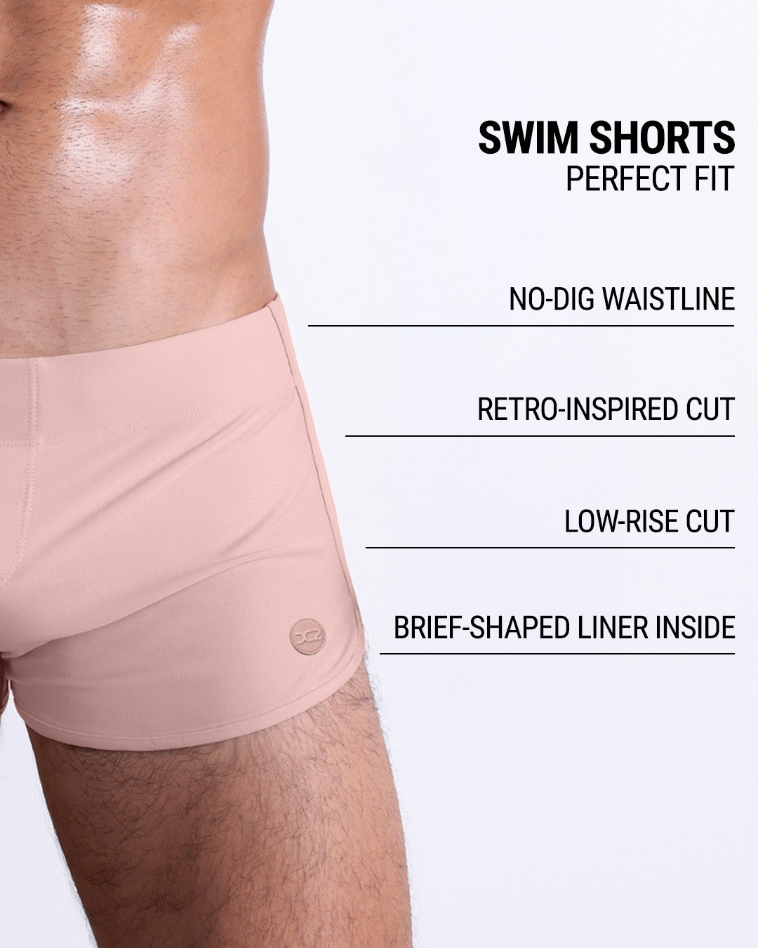 Product details graphic of Fair/Naked Pink Swim Shorts — highlighting no-dig waistline, retro cut, and inner brief liner.