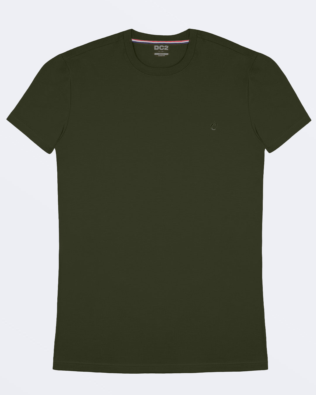 A model adjusting a green modal cotton t-shirt, showcasing the breathable, lightweight fabric ideal for summer beachwear and street style. Part of the DC2 Miami men's casual collection, featuring a perfect fit for active wear