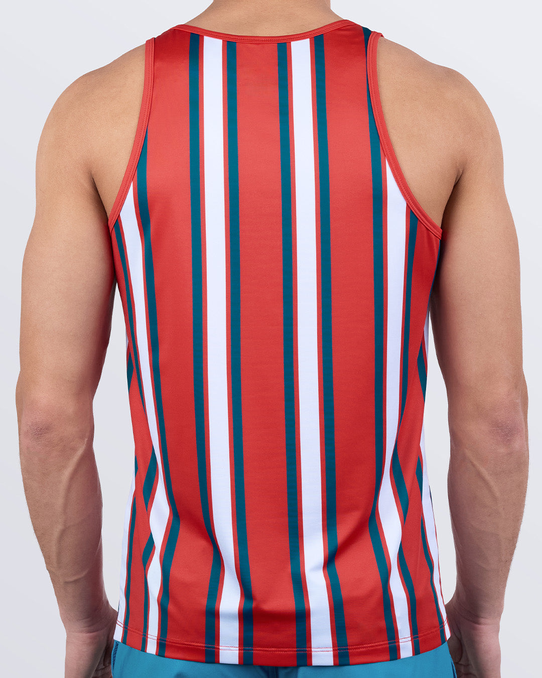 Back view of SWIFT STRIPES men’s performance tank top – bold vertical stripes in red, teal, and white – breathable activewear for gym or beach