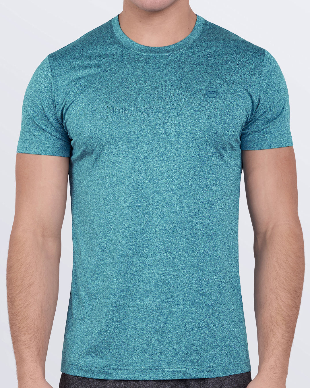 DC2 Trainer Teal Fitness T-Shirt — model wearing athletic-fit men's workout tee, in breathable stretch fabric ideal for gym, CrossFit, and fitness training.