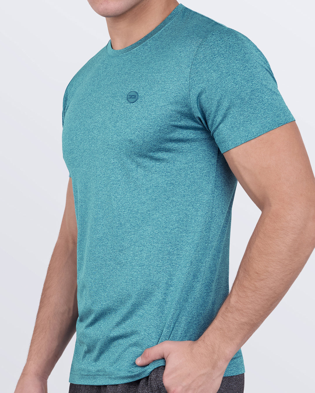DC2 Trainer Teal Fitness T-Shirt — side view showing tailored sleeves and ergonomic design for flexibility during intense workouts.