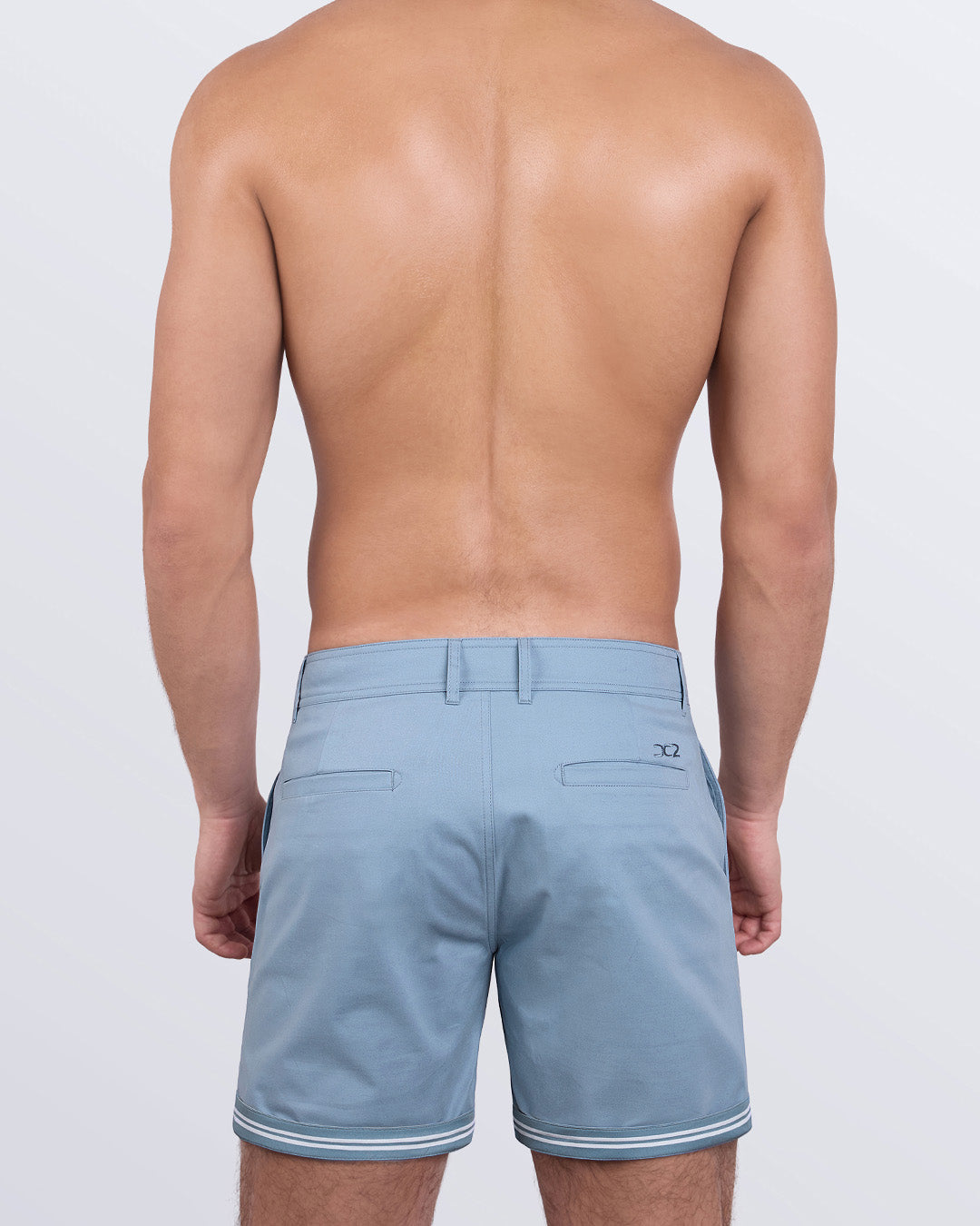 Back view of Ultimate Blue Street Shorts — welt pockets and DC2 logo embroidered above right pocket.