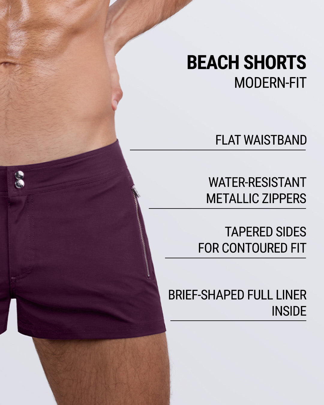 Close-up side view of a male model wearing the VERY BERRY Beach Shorts for men by DC2 Miami in a solid dark red color. These modern-fit swim shorts feature a sleek flat waistband, water-resistant metallic zippers, and tapered sides for a contoured fit. Designed with a brief-shaped full liner for added support, these premium beach shorts blend style, comfort, and functionality for the ultimate swimwear experience.