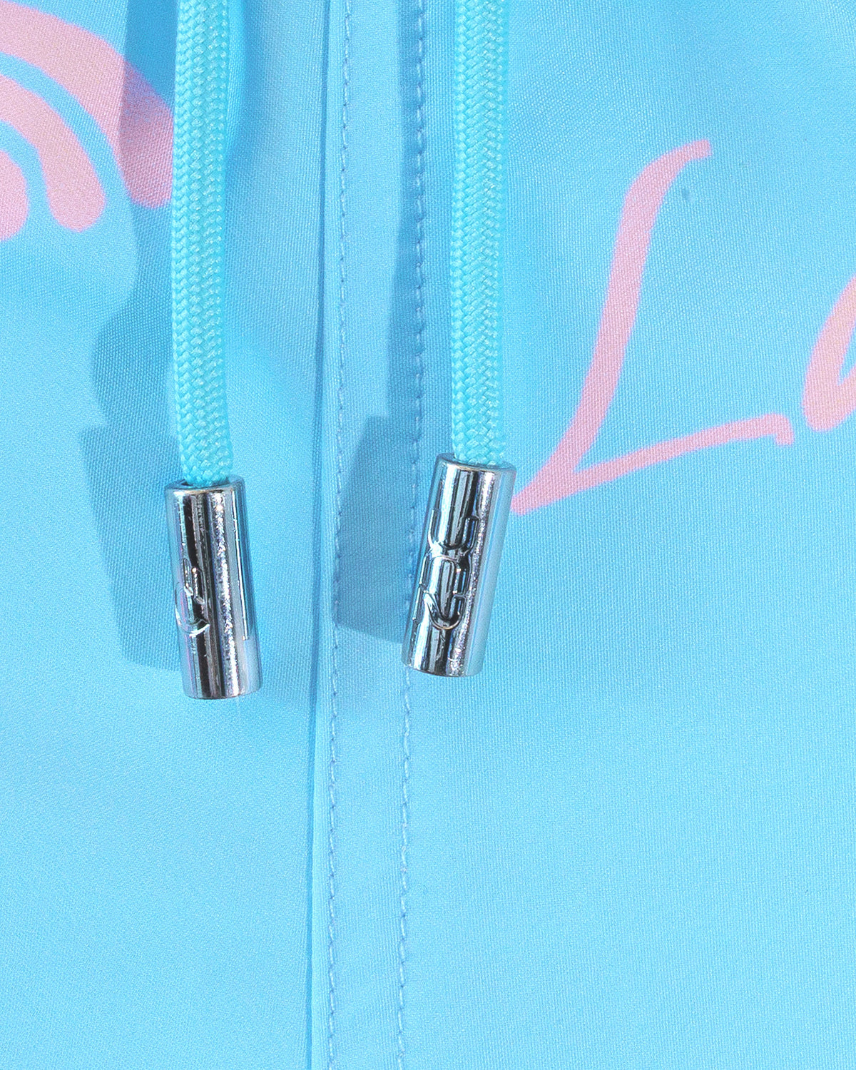 DC2 Viva La Vida (En Rose) Poolside Shorts — close-up detail of the drawstring waist with metal tips and the printed fabric texture.