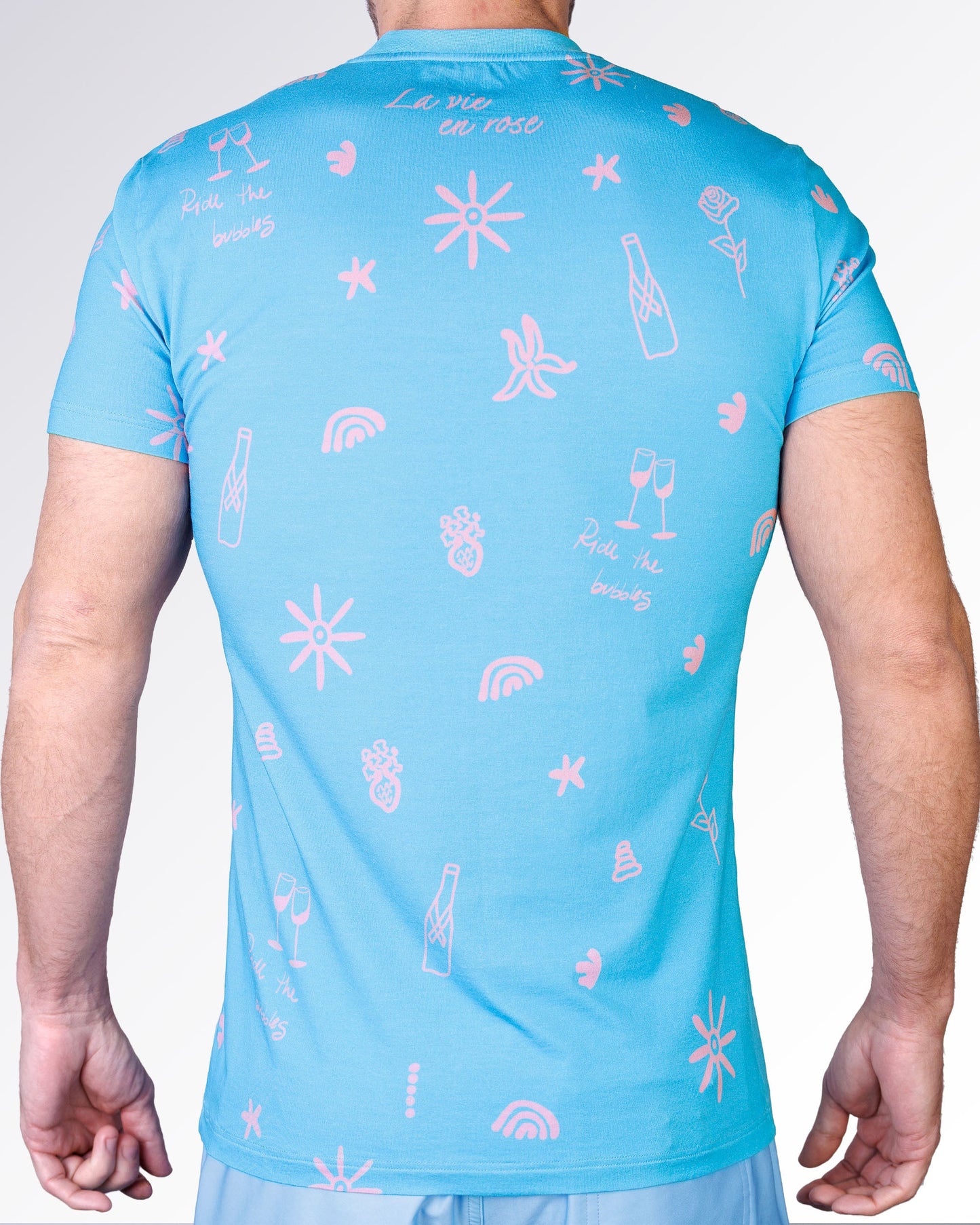 Back view of the Viva La Vida (En Rose) Cotton Graphic T-Shirt by DC2 Miami featuring all-over pink icons and handwritten details.