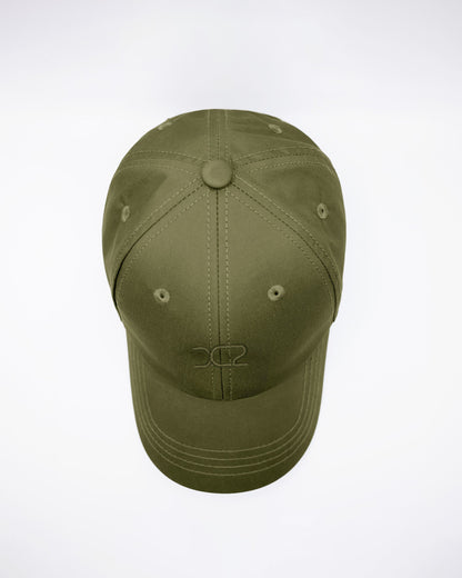 DC2 Army Green Resort Cap — top view highlighting the six-panel construction, stitched seams, and breathable eyelets.