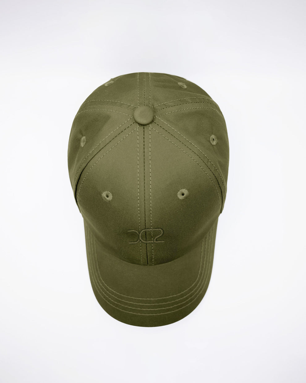 DC2 Army Green Resort Cap — top view highlighting the six-panel construction, stitched seams, and breathable eyelets.