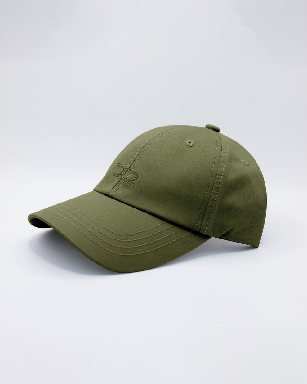 DC2 Resort Cap in Army Green — angled view emphasizing the curved brim, clean stitching, and minimal DC2 embroidery.