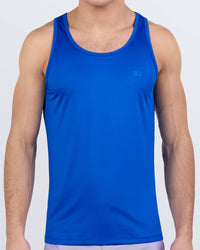 DC2 ASTRAL BLUE men’s athletic tank top with sleek, bold blue color ideal for gym training, outdoor workouts, or beachwear. Features moisture-wicking, 4-way stretch fabric.