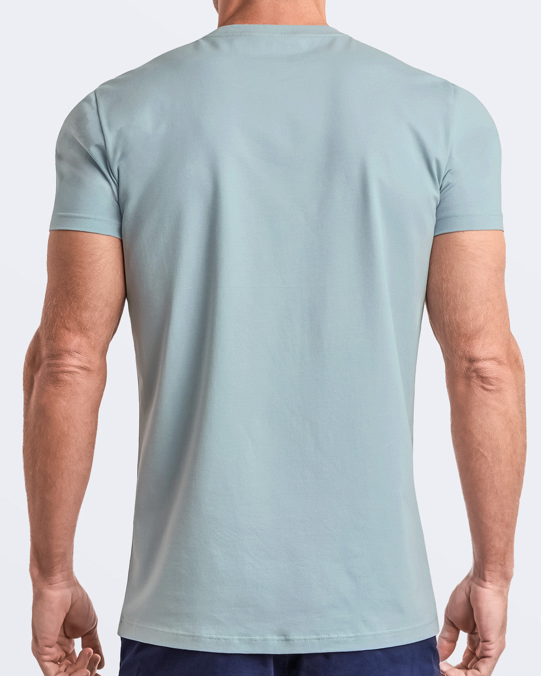 Back view of a pale light teal men's t-shirt, made from soft, durable and breathable modal cotton. Part of the DC2 Miami men's streetwear and beachwear collection, ideal for casual summer outfits.