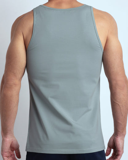 Back view of the BARELY TEAL men's fitness breathable tank top made of modal cotton blend in a solid light blue/green color by DC2 Miami menswear.