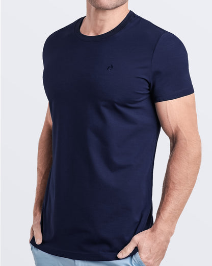 Side view of a men's premium navy blue modal cotton t-shirt and embroidered DC2 logo. Perfect for a modern casual look, this streetwear tee is part of the DC2 Miami men's beachwear collection, designed for comfort and style.