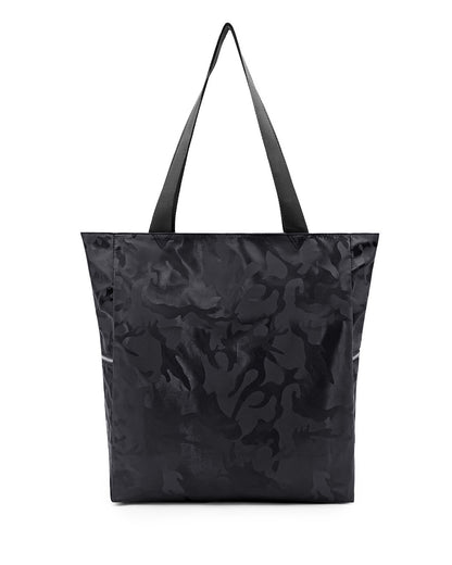 The BLACK CAMO Poolside Tote Bag by DC2 Miami, features a bold black camouflage design. This bag is a perfect companion for beach outings, shopping trips, or everyday use.