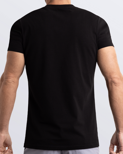 Back view of a solid black men's t-shirt, made from soft, durable and breathable Pima cotton. Part of the DC2 Miami men's streetwear and beachwear collection, ideal for casual summer outfits