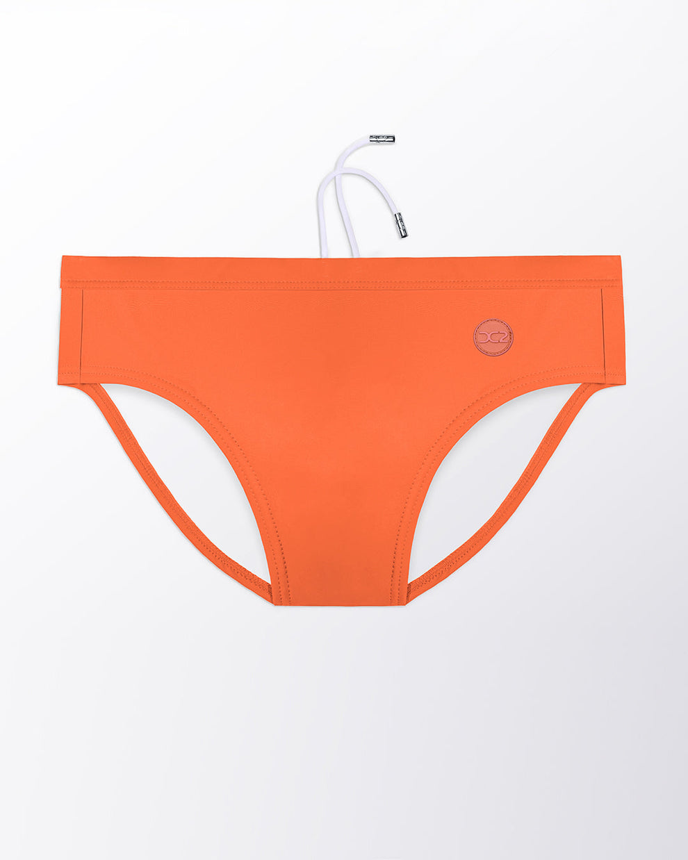 Flat lay of the DC2 Bronze Factor Swim Brief, featuring a warm bronze tone and sleek, sculpted swim brief design.