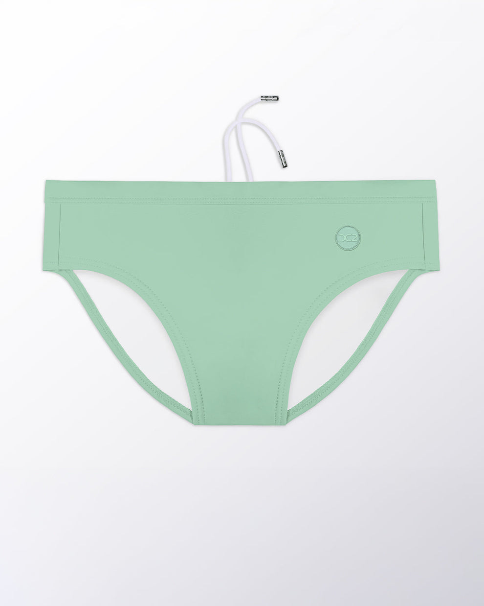 Flat lay of the DC2 Cabana Green Swim Brief, featuring a fresh green tone and sleek, sculpted swim brief design.