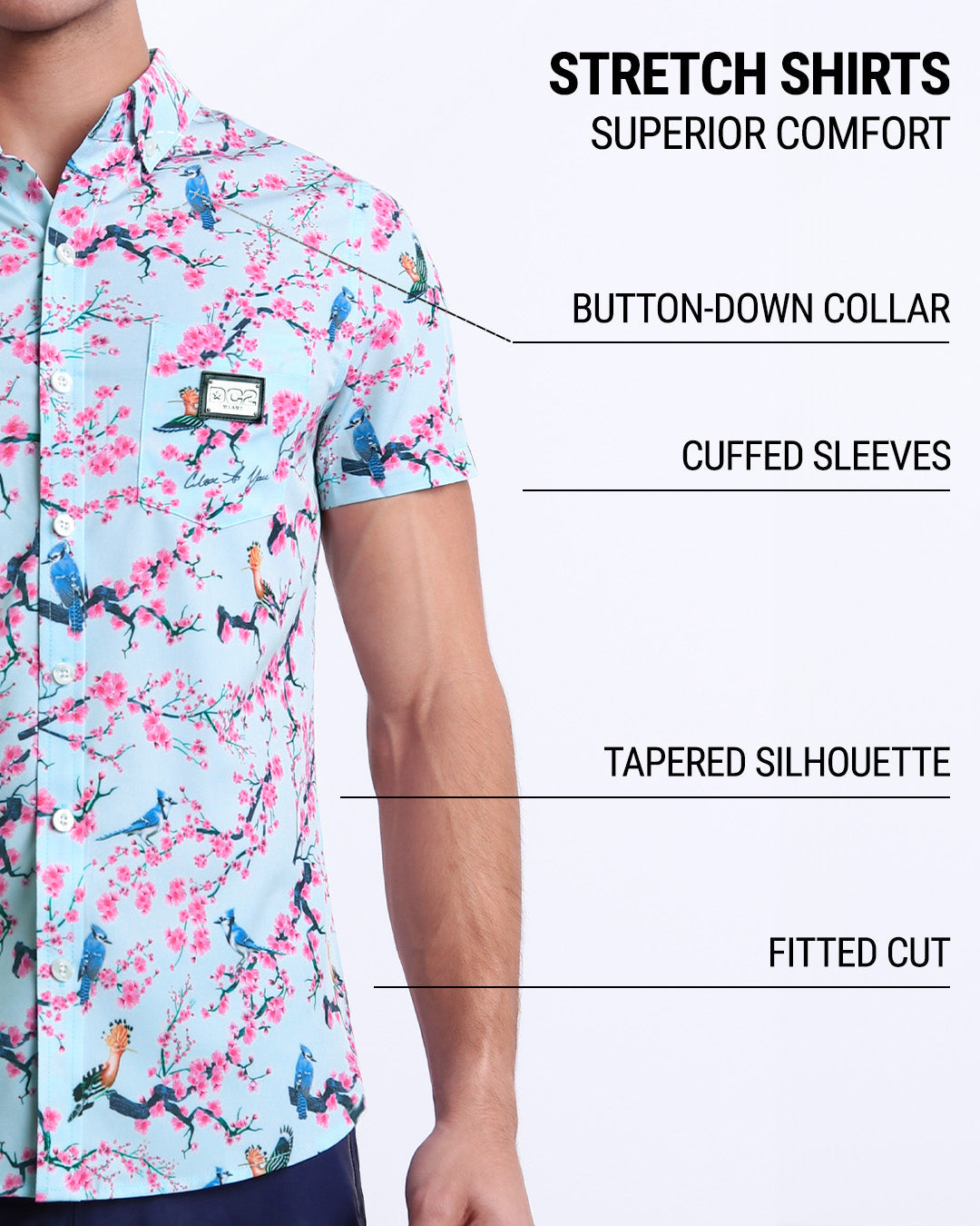 Infographic displaying the contemporary fit of DC2 men's sleeveless Hawaiian Stretch Shirt. This button up shirt features a button-down collar, cuffed sleeves, tapered silhouette, and a fitted cut.