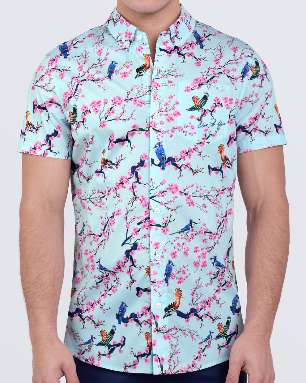 Close to You short sleeve cotton shirt with light blue base, cherry blossoms, and colorful bird print by DC2 Miami.