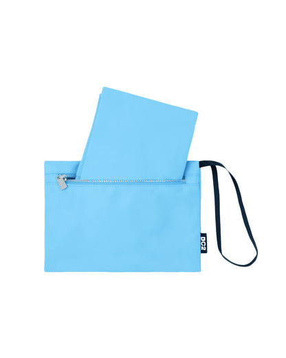 Close-up view of the detachable pouch from the COASTAL BLUE Poolside Tote Bag by DC2 Miami. The pouch features a stylish solid blue color, a secure zippered closure, and a convenient wrist strap for easy carrying. Designed for versatility, this pouch is perfect for storing small essentials.