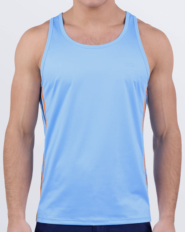 Male model wearing COASTAL BLUE men’s casual Tank Top. A premium quality top in a solid light blue color with orange and navy blue stripes on the sides, a men’s beachwear brand from Miami.