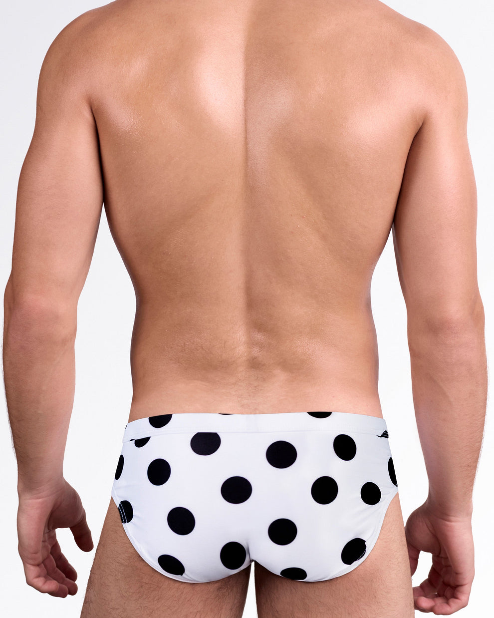 DC2 Miami Connect the Dots Swim Brief — back view showcasing the black polka dot pattern and full swim brief coverage.
