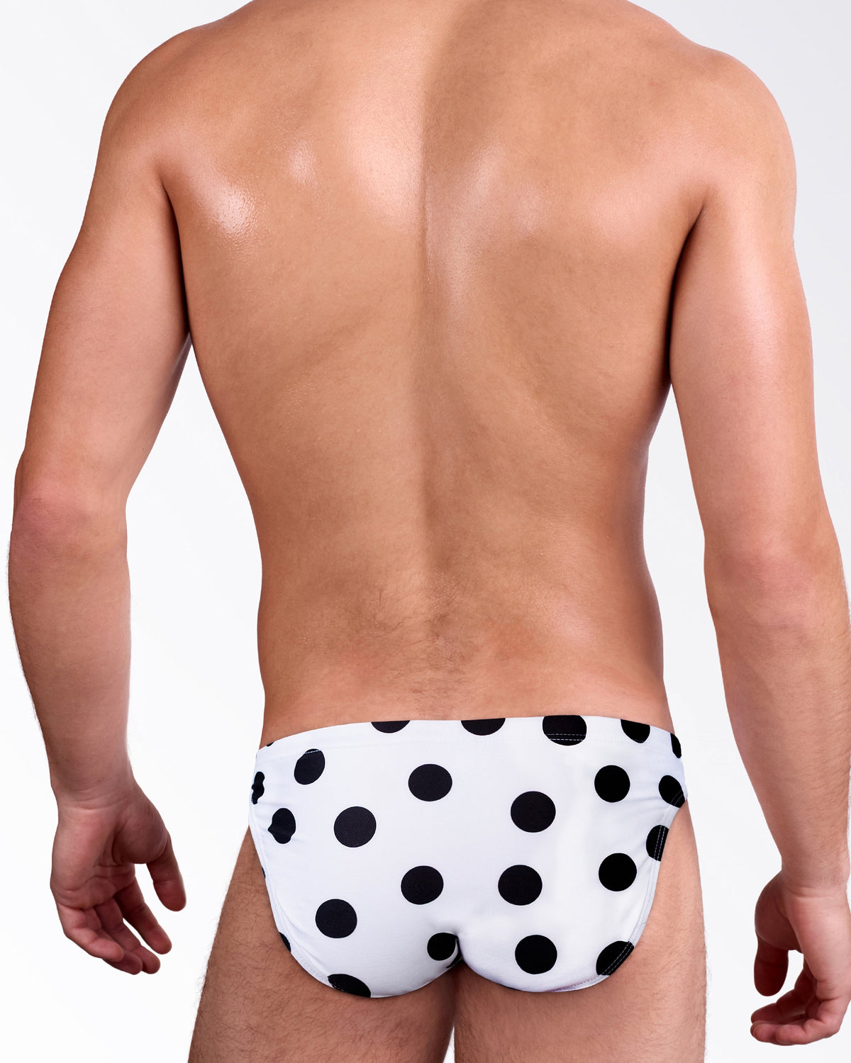 DC2 Miami Connect the Dots Swim Mini Brief — back view highlighting the black polka dot pattern and cheeky fitted cut.