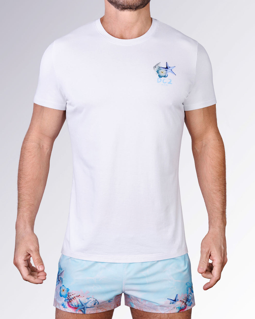 Full front view of the Coral Way Cotton Graphic T-Shirt by DC2 Miami, paired with matching pastel blue Coral Way Poolside Shorts.