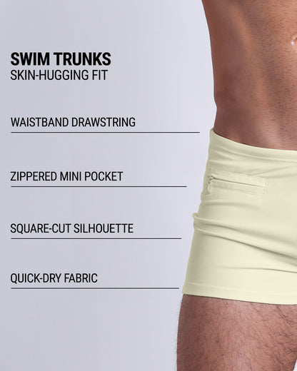 Infographic explaining the Swim Trunks swimming shorts by DC2. These Swim Trunks have a skin-hugging fit, have a waistband drawstring, zippered mini pocket, square-cut silhouette and quick-dry fabric.