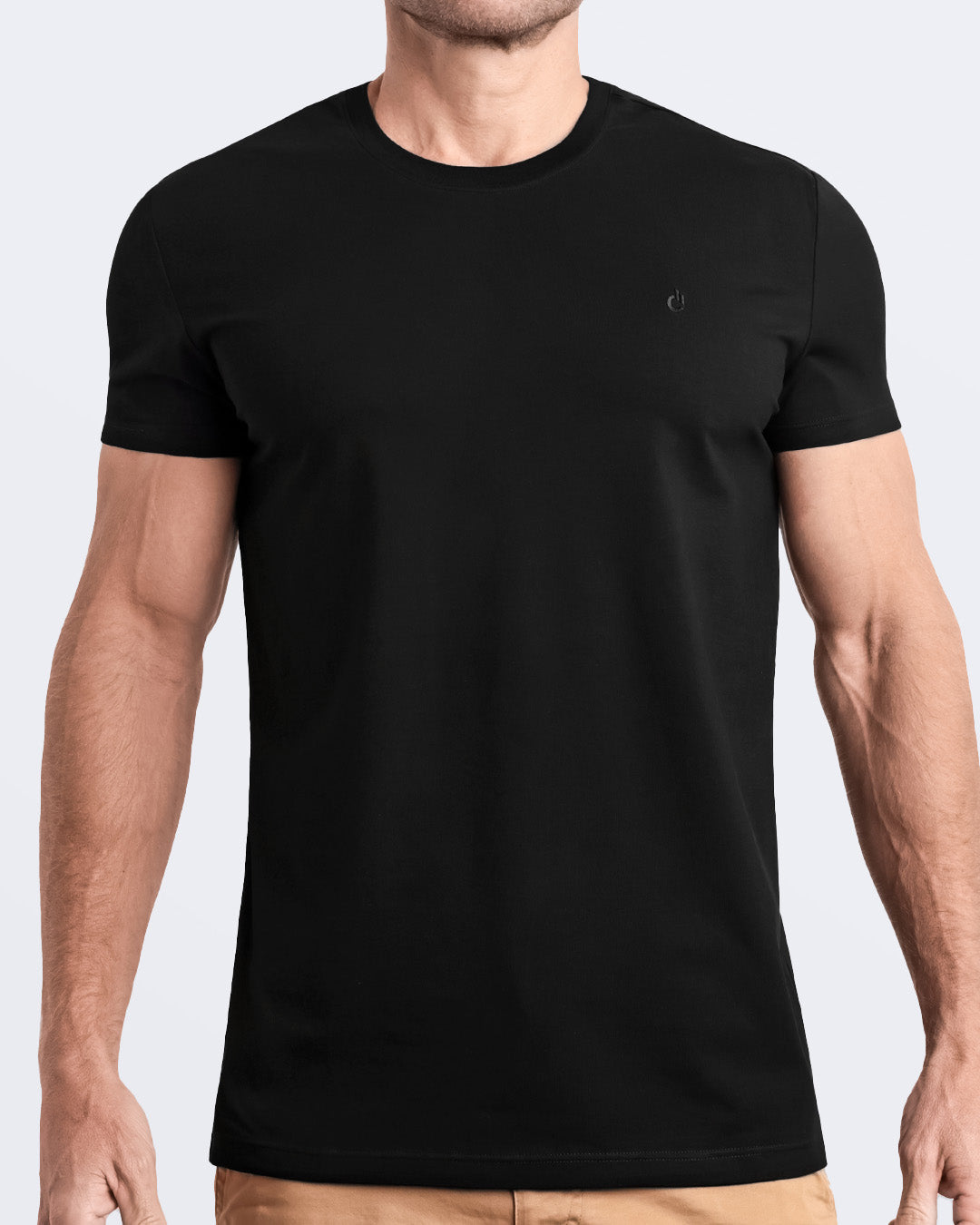 Frontal view of a male model wearing a black modal cotton t-shirt, crafted for stylish casual wear and beachwear by DC2 Miami. Premium quality men's streetwear t-shirt, perfect fit for summer fashion.