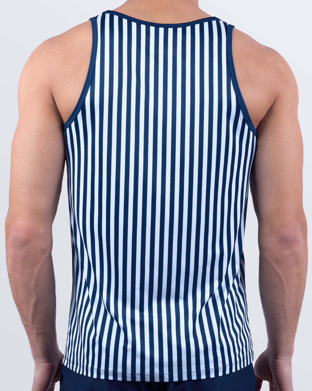 Back view of FAST LINES (NAVY BLUE) tank top for men – athletic fit with vertical navy and white stripes – lightweight performance fabric