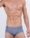 Front view of FAST LINES (NAVY BLUE) Swim Sunga by DC2 Miami – men’s striped Brazilian swimwear with contoured fit and mid-waist coverage.