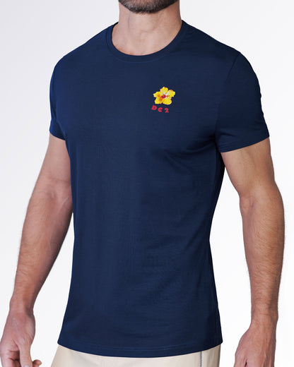 Angled view of the Flower Powers (Blue) Graphic T-Shirt featuring a navy crewneck silhouette with vibrant floral chest artwork and a modern tailored fit.