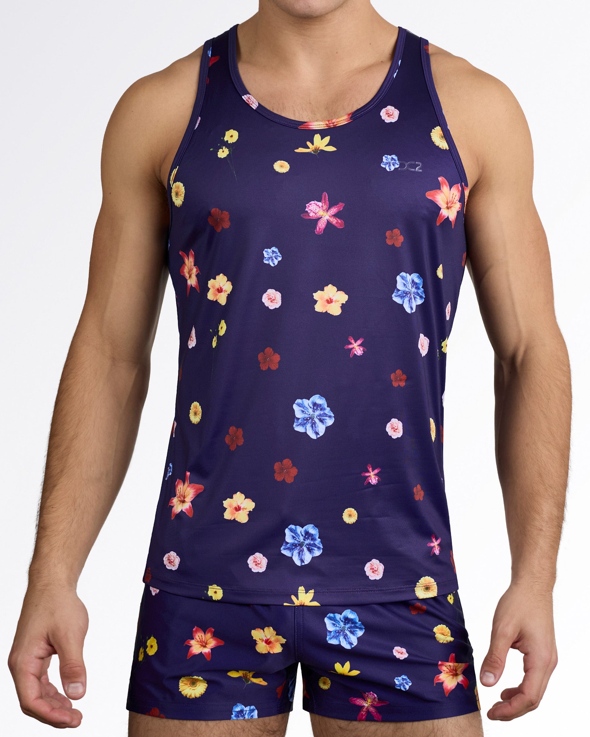 DC2 Flower Powers (Blue) Tank Top — styled with matching navy floral shorts, showcasing coordinated men’s summer beachwear set.