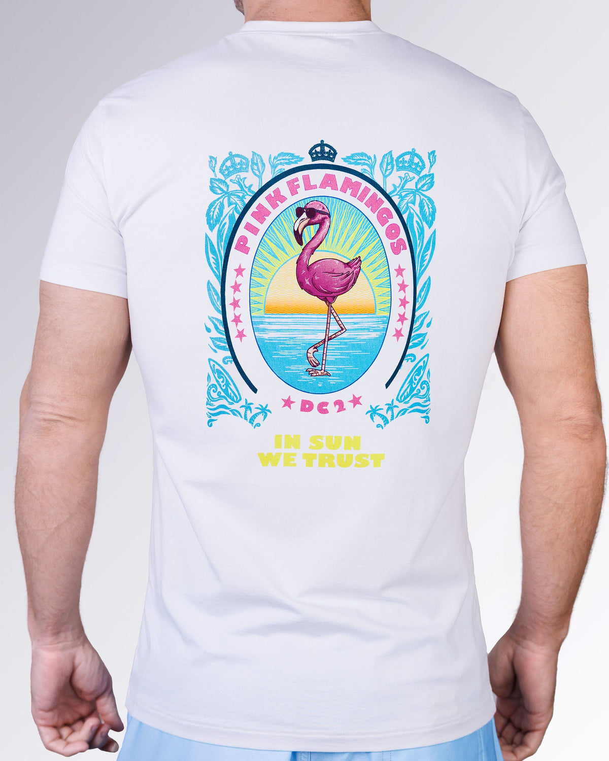 Pink Flamingos Cotton Graphic T-Shirt by DC2 Miami featuring a colorful flamingo sunset back graphic on a clean white crewneck tee.