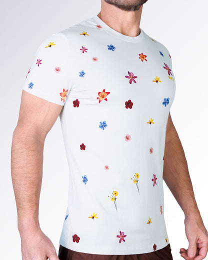 Flower Powers Cream Graphic T-Shirt by DC2 Miami shown from the side, highlighting the all-over floral print with colorful blooms on a cream background.