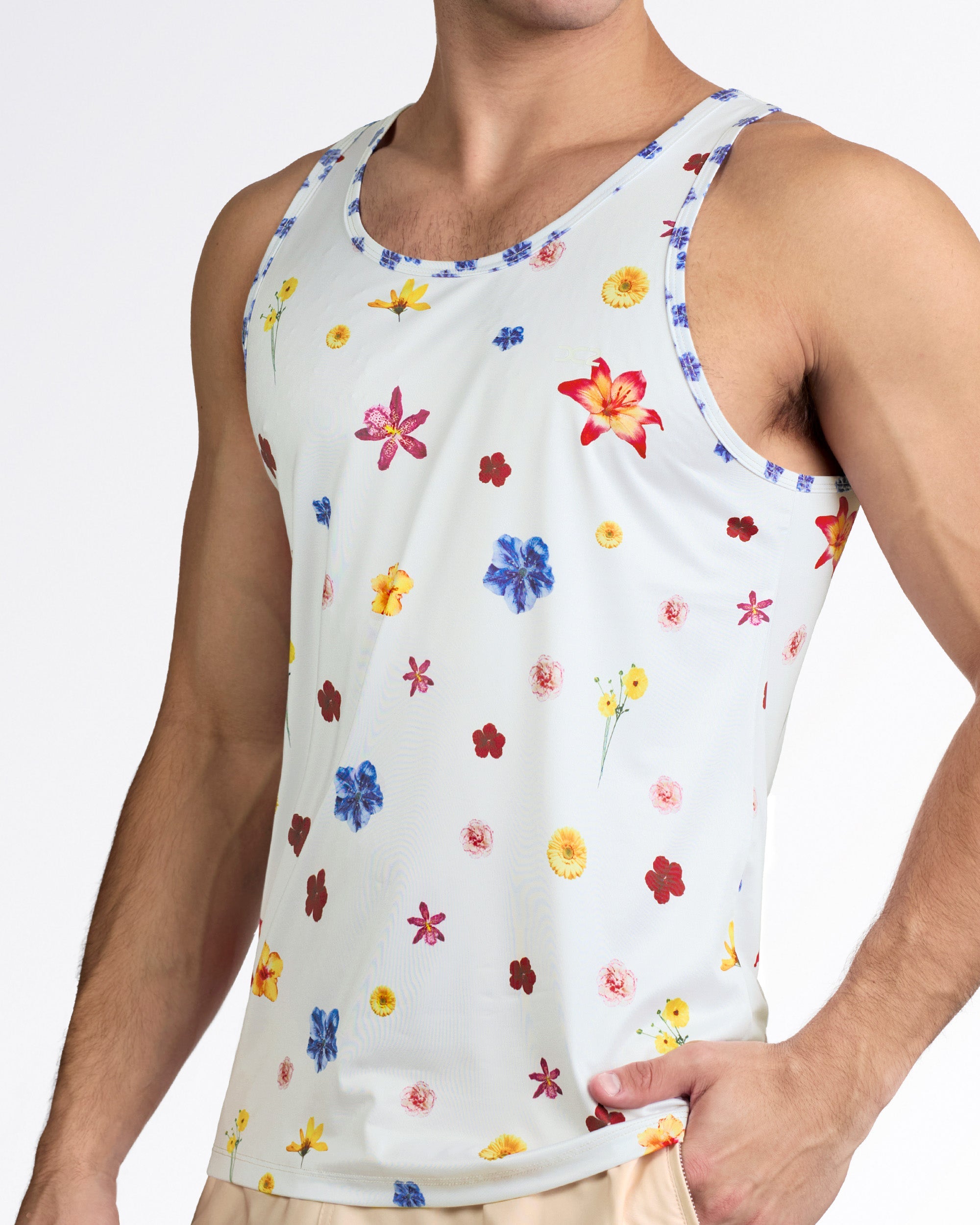 DC2 Flower Powers (Cream) Gym Tank Top — angled side view highlighting athletic cut, wide shoulder straps, and soft stretch material.