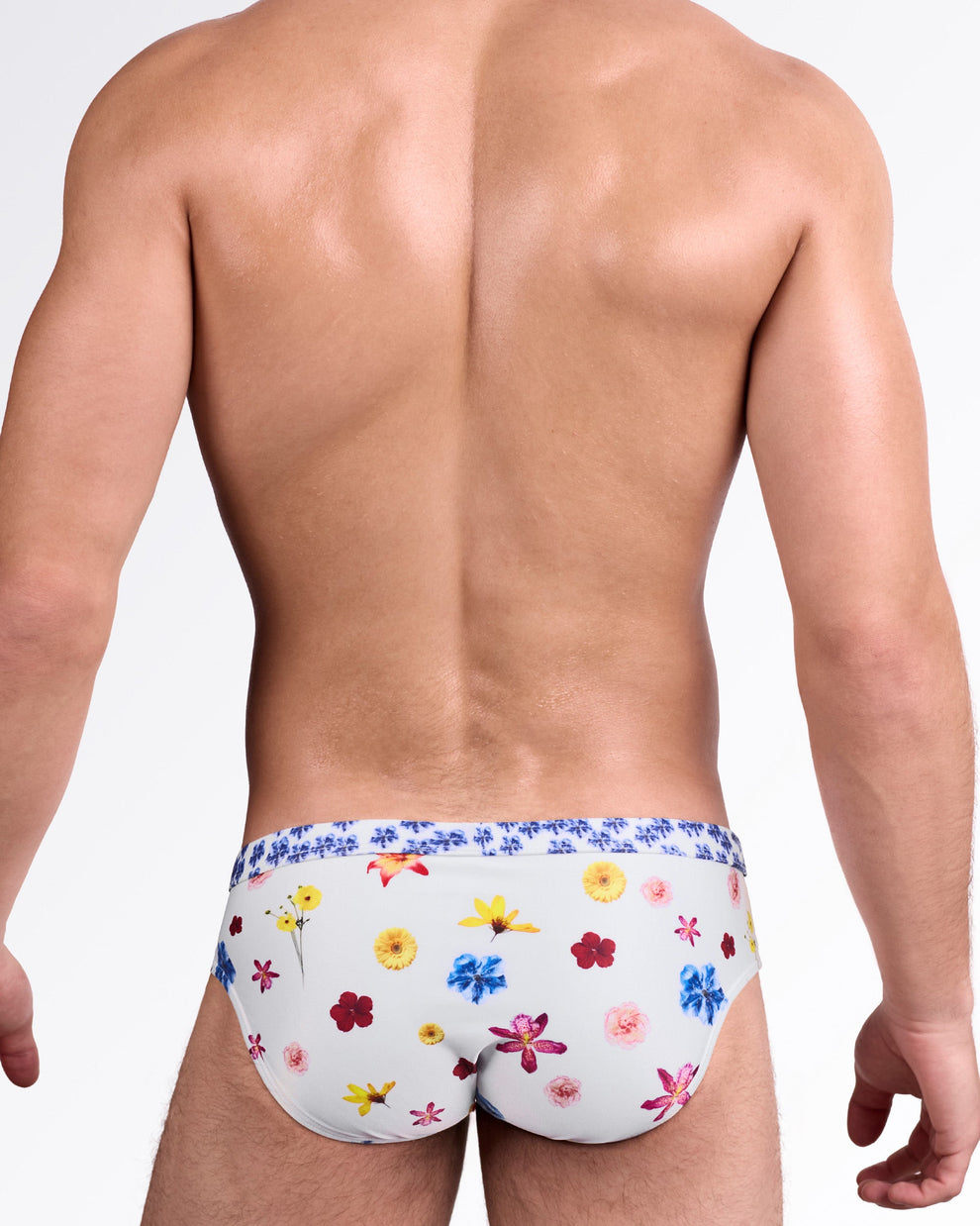 BANG! Flower Powers (Cream) Swim Brief — back view showcasing allover vibrant flower print, smooth contour fit, and clean waistband finish.