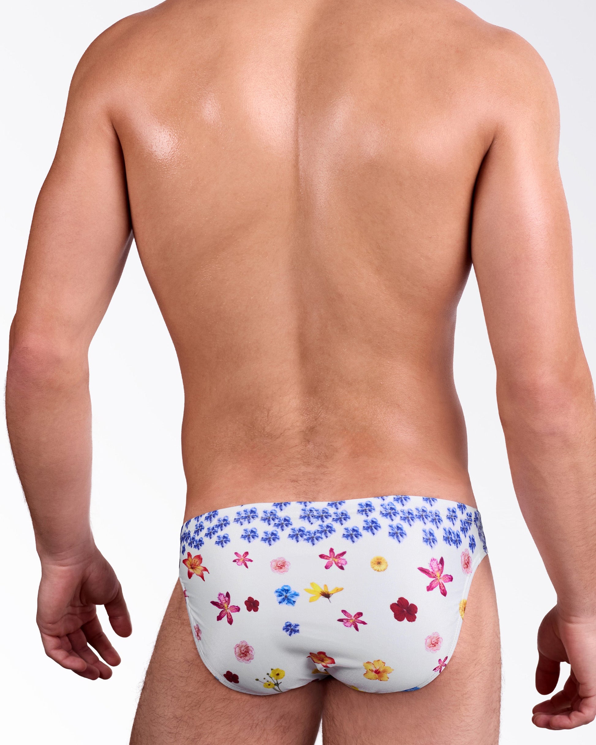 DC2 Flower Powers (Cream) Swim Mini Brief — back view showing full floral print coverage on cream background with a sleek, contoured mini brief fit.